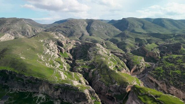 The dramatic cliffs that cradle Hasankeyf have witnessed the ebb and flow of empires, preserving the echoes of Mesopotamian cultures etched in the stone over thousands of years.
