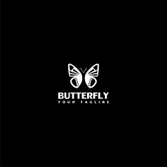 Butterfly logo template icon isolated on dark background