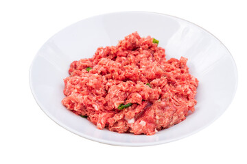 A bowl of ground pork on white background. The meat is raw and waiting to be cooked. Weighting the ingredients before cooking will benefit a person's health and eating habits.