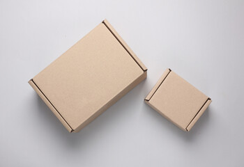 Parcel cardboard boxes on gray background. Top view