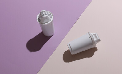 Cartridge filters for water filtration on [pastel background.