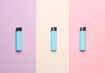 Lighters on pastel background. Minimalism.