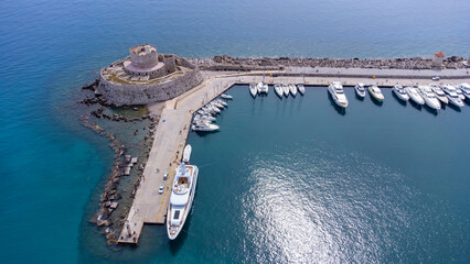 Mandraki port of Rhodes city harbor and Elli beach a popular summer tourist destination, aerial...
