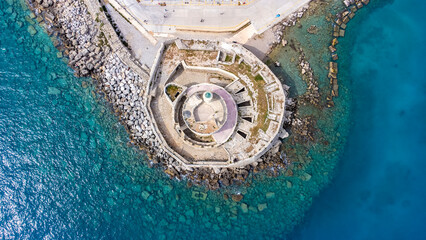 Mandraki port of Rhodes city harbor and Elli beach a popular summer tourist destination, aerial...