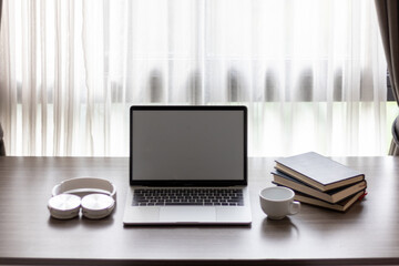 Notebook computers are geared up for online work because it's when companies allow working from home. The concept of working from home with Notebook via online system. Copy space for text