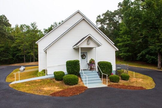 A tiny nondescript white country church