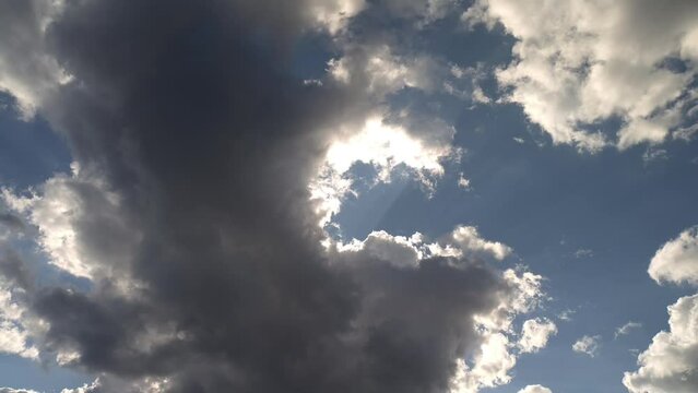 Despite the gray clouds blocking the sun, the sky is still radiant