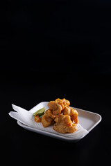 Chicken Karaage Japanese Fried chicken isolated in black background