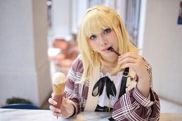 Portrait of a beautiful young woman game Cosplay with blonde hair with ice cream - 613268713