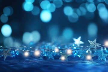 Garland of Christmas stars on an abstract background with bokeh.