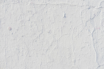 Texture of old light painted wall, chipped, scratches. Stucco wall. Natural vintage background