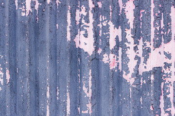 Abstract dirty corrugated metal surface, peeling paint, rusty texture, background