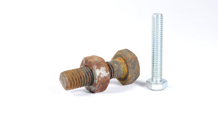 close up of a rusted bolt with nut together with new non rusted bolt ,white background