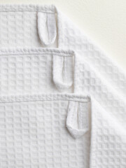 cotton fabric of different colors, waffle towel without pattern, macro