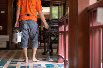 man chose to use exterminate chemicals Termites that are not toxic to humans are mixed with water...