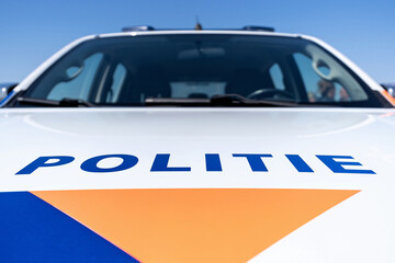 front of a Dutch Police car
