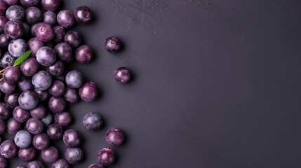 Açaí berries, isolated on slate tone background with copyspace, Generative AI.
