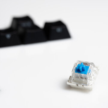 Keycaps and Keyswitch for Mechanical Keyboards Isolated on White Background
