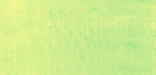 Yellow speckled hand-painted illustration texture design of old distressed vintage grunge concrete with green stains. damaged textured abstract washed cement backdrop as web banner background.