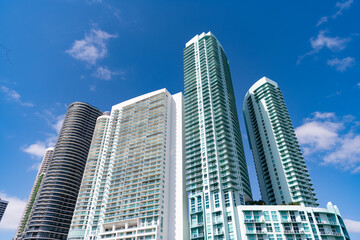 Fototapeta na wymiar horizontal photo of skyscraper architecture building. high skyscraper building on blue sky.