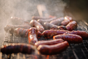 Grilled sausages on the grill, soft focus
