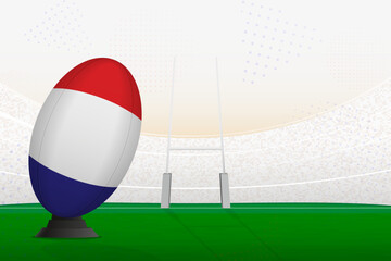 France national team rugby ball on rugby stadium and goal posts, preparing for a penalty or free kick. © boldg