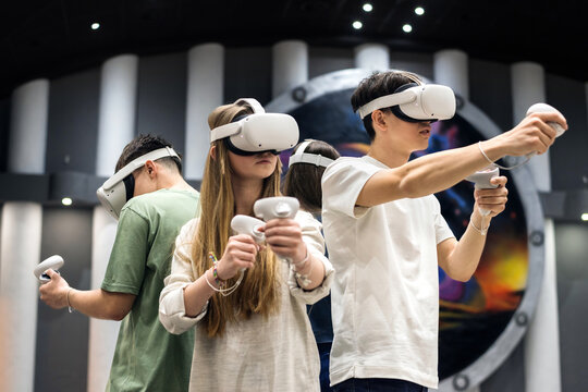 A team of friends playing VR