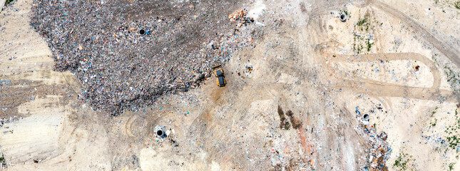 Aerial top view of a city garbage dump. Waste Disposal Facility