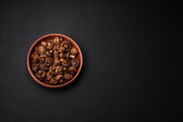 Delicious champignon mushrooms with salt, spices and herbs