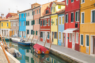 Naklejka na ściany i meble The Burano island near Venice, a canal with colorful houses, Italy, Europe.