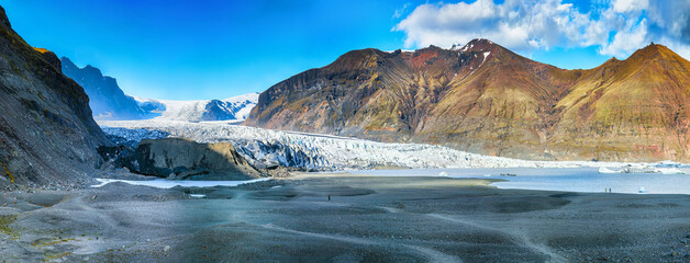 Breathtaking view of Skaftafellsjokull glacier tongue and volcanic mountains around on South...