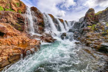 Breathtaking view of  Kolufossar waterfall at summer sunny day.