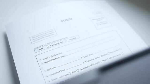 Printer Printing a Form Application Document To be Filled Closeup