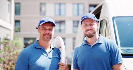 Technician Electrician Man With Cable - Powered by Adobe