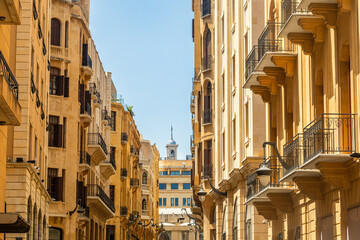 Naklejka premium Old Beirut central downtown narrow street architecture with buildings and street lights, Lebanon