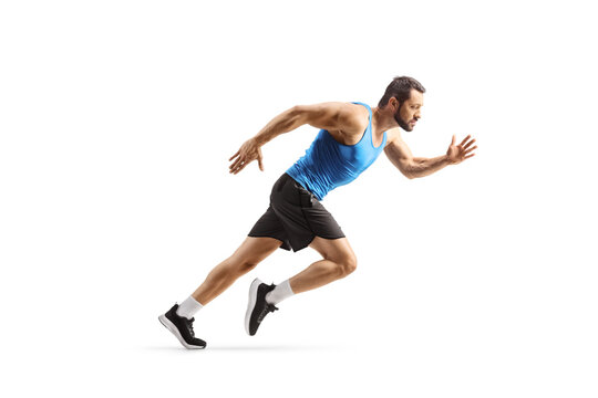 Full length profile shot of a fit man starting a run