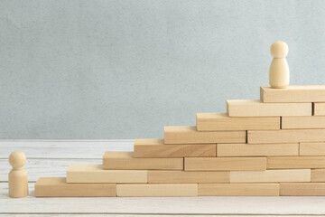 Top view of young man looking up and his arm stretched