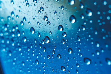 Water drops condensed on a glass window, rainy weather, raindrops, bluish background. Generative AI