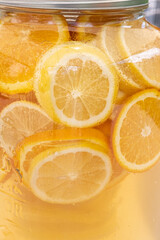 lemonade cocktail cool drink from orange and grapefruit in a glass jar