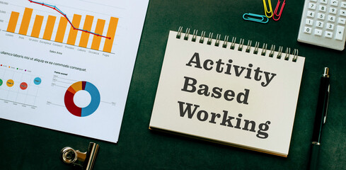 There is notebook with the word Activity Based Working. It is as an eye-catching image.