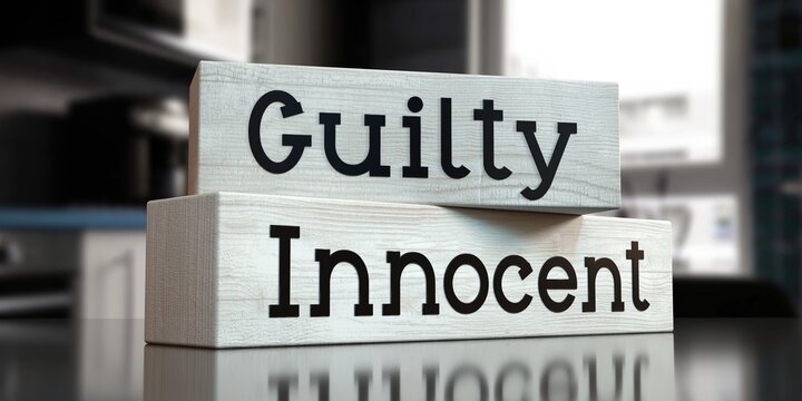 Innocent, guilty - words on wooden blocks - 3D illustration