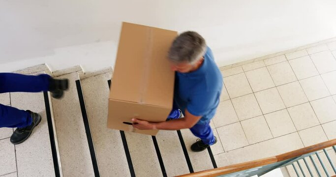 Overseas Relocator Movers Delivering Boxes