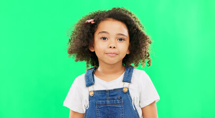 Raise eyebrow, green screen and face of child on in studio for comic, meme and funny facial expression. Emoji mockup, childhood and portrait of young girl with happiness, humour reaction and excited