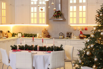 Cozy spacious kitchen decorated for Christmas. Interior design