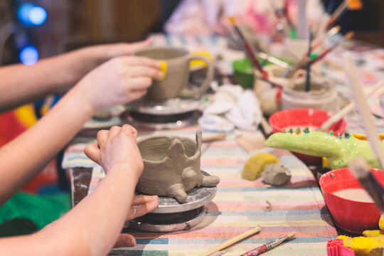 Plasticine modeling clay in children class. Clay projects teacher school.  Stock Photo by ©poznyakov 219325378