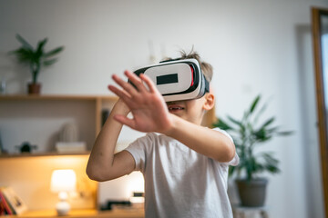 boy male caucasian child at home enjoy virtual reality VR headset
