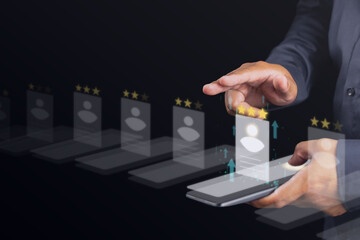 Recruitment concept. Human Resource Manager chooses new people to join an organization or support a cause. CV holograms are happened on smartphone.