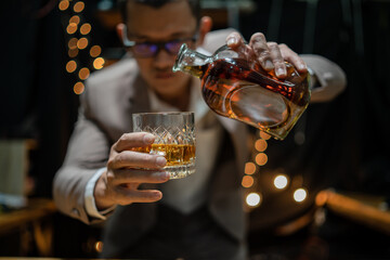 Businessmen in suits drinking  Celebrate whiskey.