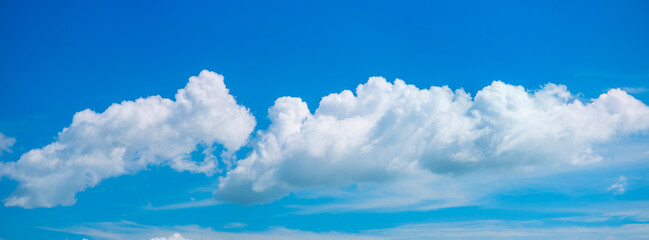 Blue sky and white clouds The freshness of a new day Bright blue background Feel relaxed like in the sky Landscape image of blue sky and thin clouds