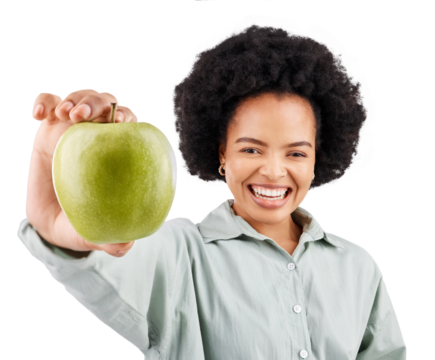 Portrait, green apple and woman smile isolated on a transparent, png background. Food, health fruit and laugh of African person with fruits, nutrition and healthy diet for wellness, vegan and detox
